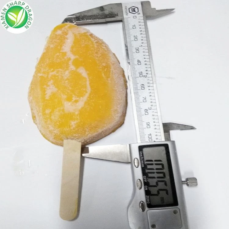 frozen mango on a stick